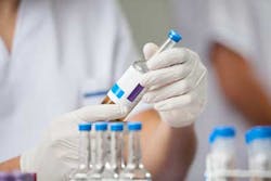 Researcher With Bottle Dreamstime Researcher With Bottle Dreamstime