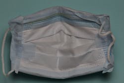 Figure 6b: Check to see if more tape is required to close the gap between the filter and mask. If needed, add tape to support the weaker areas. Figure 6b: Check to see if more tape is required to close the gap between the filter and mask. If needed, add tape to support the weaker areas.