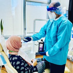 Dr. Scott Froum treating a patient in his office Dr. Scott Froum treating a patient in his office