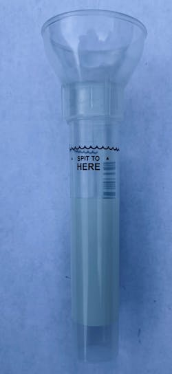 Figure 2: Patient expectorates into a collection tube up to a required volume Figure 2: Patient expectorates into a collection tube up to a required volume