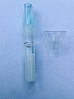 Figure 3: Patient screws on a buffer solution and mixes the saliva and buffer Figure 3: Patient screws on a buffer solution and mixes the saliva and buffer
