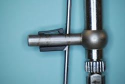Figure 6: A close-up view of the BETTr torque indicator having been set to the mark at 15 N-cm. This device accounts for the arm&rsquo;s thickness so that when it is swung, the indicator remains stable up to the arm&rsquo;s midpoint.
