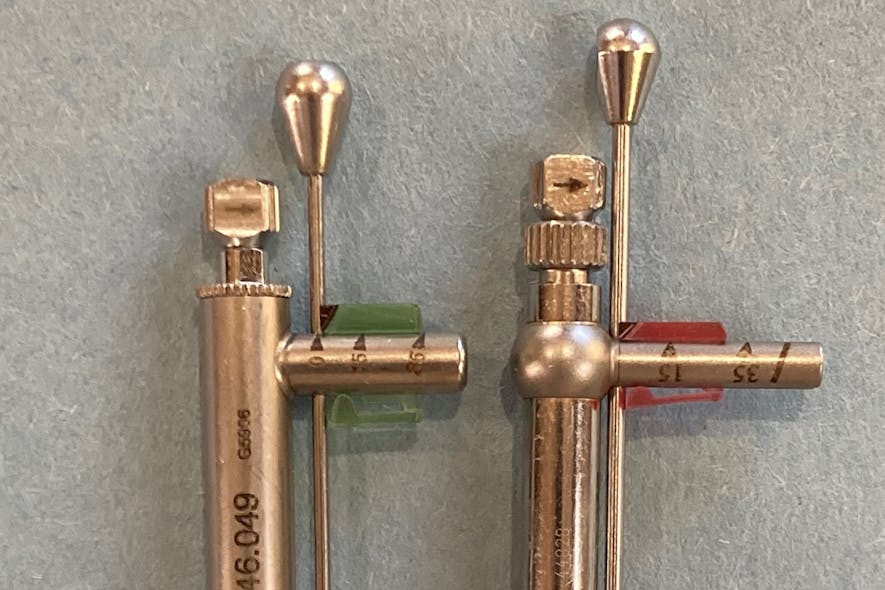 Figure 4: The SmartMarker on implant cantilever beam wrenches (green is Straumann; red is Nobel Biocare)