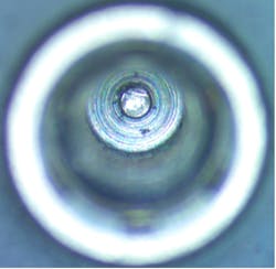 Figure 2: Debris in the screw base of a brand-new implant