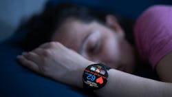 woman sleeping with a wearable sleep watch woman sleeping with a wearable sleep watch