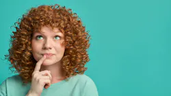 a redheaded woman on a turquoise background a redheaded woman on a turquoise background
