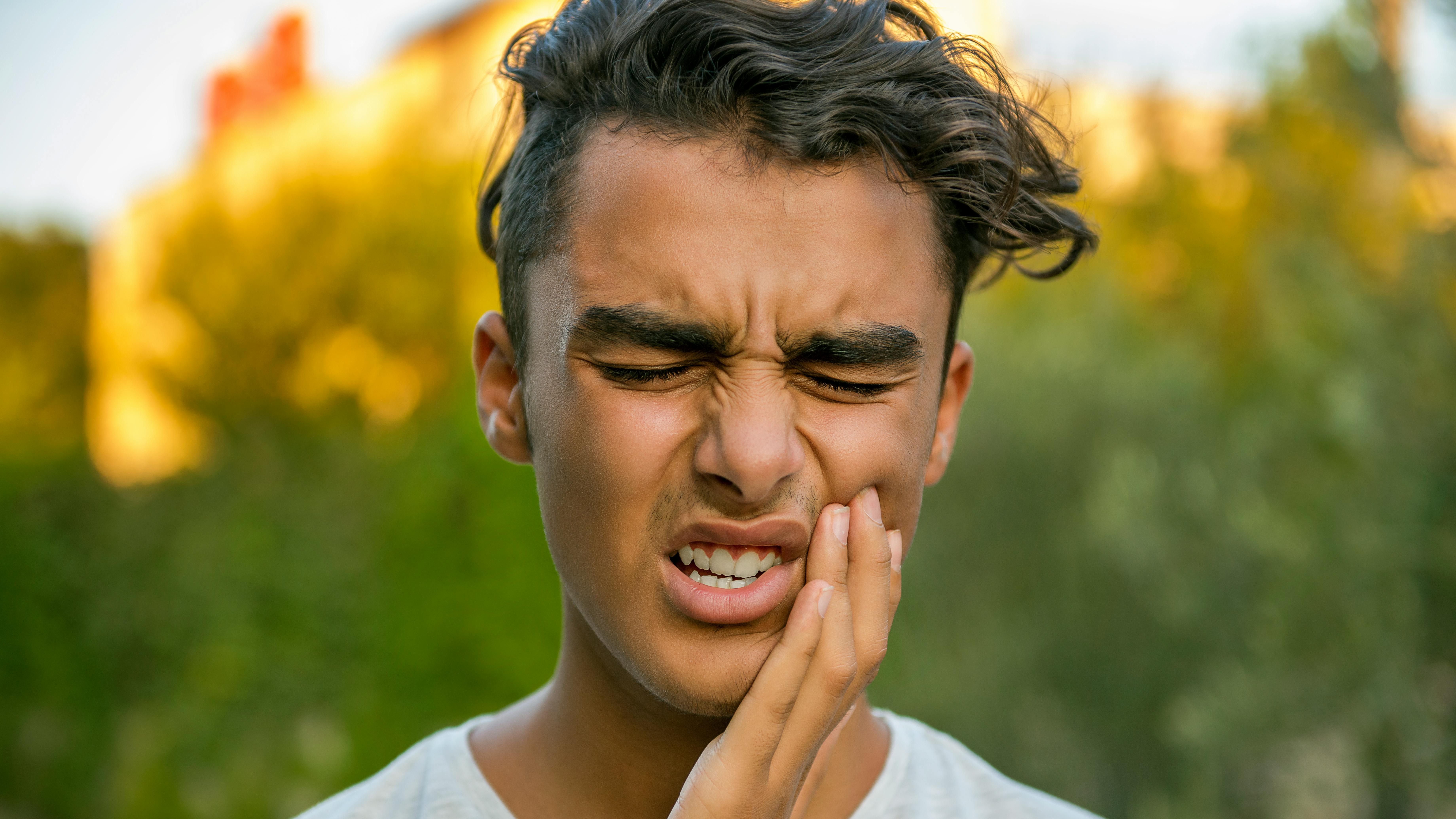 young main with oral pain